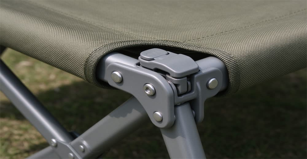 Close-up detail of blue emergency folding cot showing aluminum frame and Oxford fabric bed surface durable camp cot