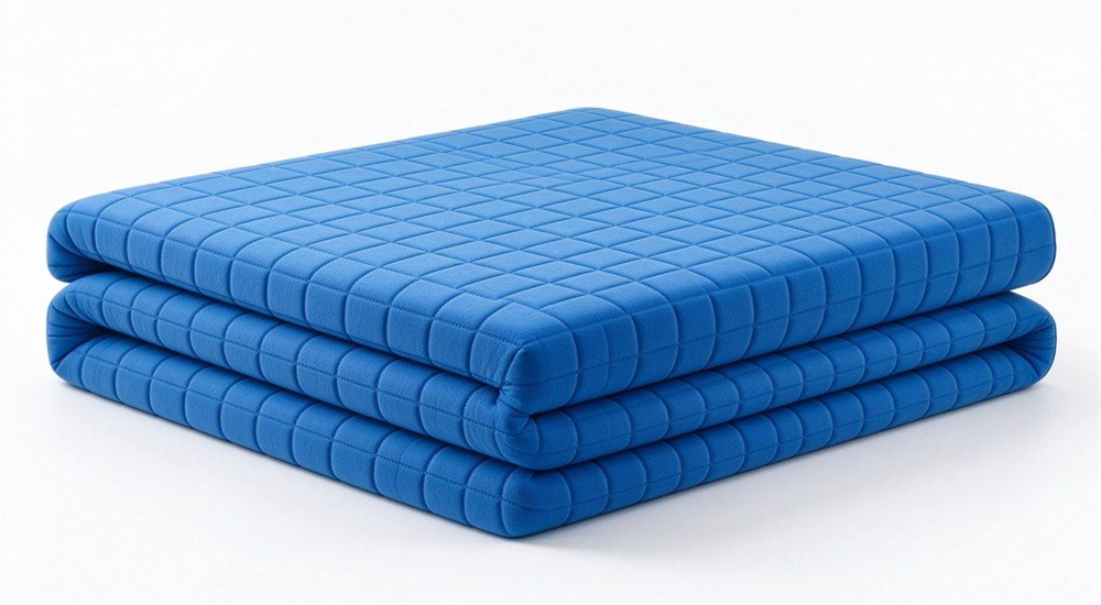 Blue check foam school mattress trifolded on white background for school mattress wholesale, showing foldable foam core design for bunk bed mattress supply to boarding schools Blue check foam school mattress trifolded on white background for school mattress wholesale, showing foldable foam core design for bunk bed mattress supply to boarding schools